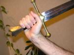 <img150*0:stuff/Hand_holding_a_sword.jpg>