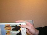 <img150*0:stuff/Hand_holding_book._.jpg>