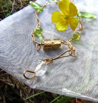 <img200*0:stuff/goldgreendroplet01.JPG>