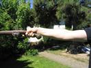 hand holding pistol